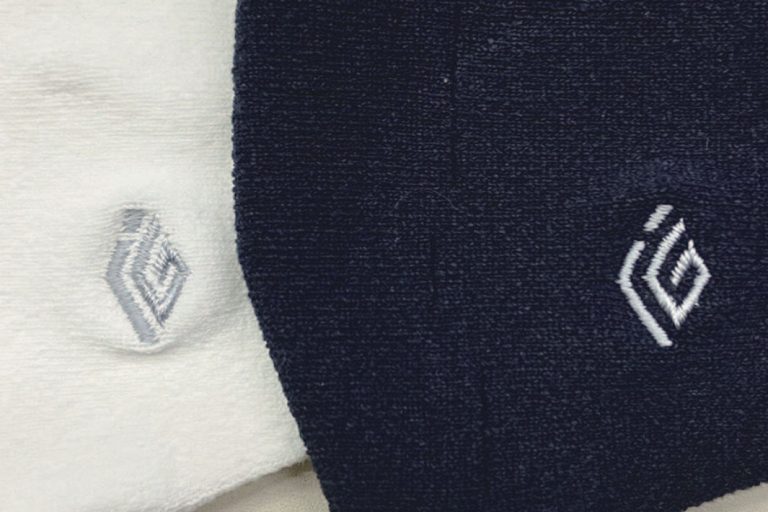 アイジー工業・佐藤繊維　山形の企業同士、業界越えコラボ　ロゴ入りマスクを製作